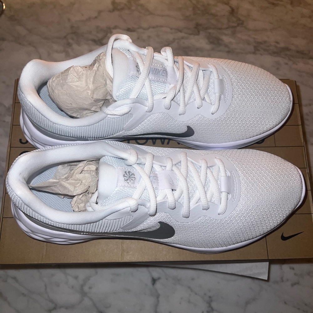 Woman’s size 9 White Nike Revolution 6NN